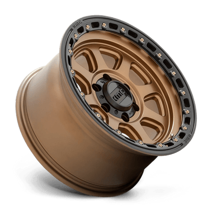 KMC KM548 CHASE Matte Bronze W/ Black Lip wheel showcasing aggressive design and off-road durability.