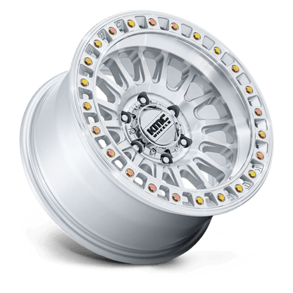 KMC KM552 IMS Gloss Silver W/ Machined Face wheel showcasing aggressive styling and off-road performance.