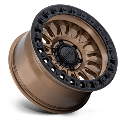 KMC KM552 IMS Matte Bronze W Gloss Black Lip wheel showcasing aggressive design and off-road performance.