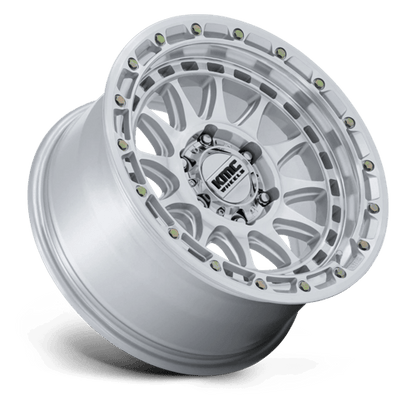 KMC KM556 CRUX Gloss Silver W/ Machined Face wheel showcasing rugged design and durability for off-road vehicles.