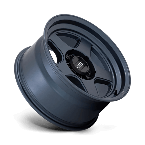 KMC KM728 LOBO Metallic Blue wheel showcasing rugged design and aggressive styling for off-road vehicles.