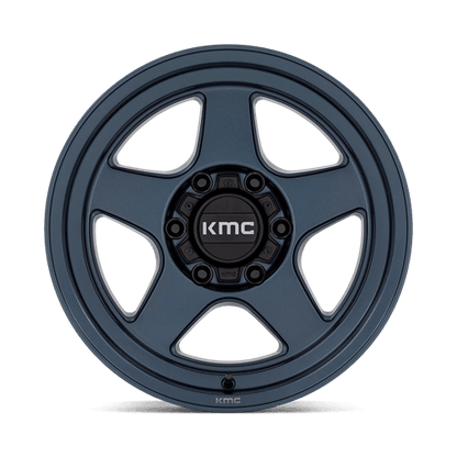 KMC KM728 LOBO Metallic Blue wheel showcasing rugged design and durability for off-road vehicles.