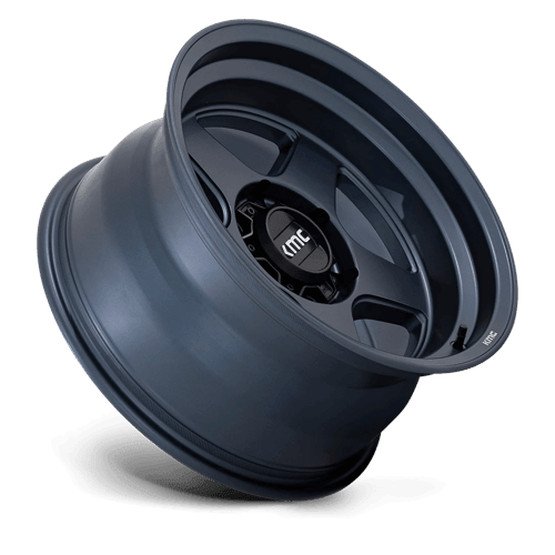 KMC KM728 LOBO Metallic Blue off-road wheel showcasing rugged design and bold styling for trucks and SUVs