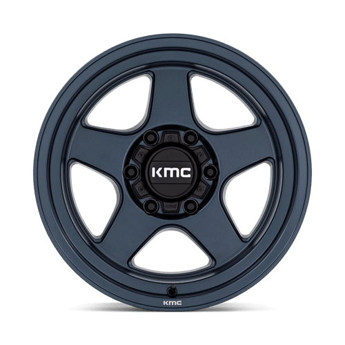 KMC KM728 LOBO Metallic Blue wheel showcasing its rugged design and durability for off-road vehicles.