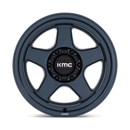 KMC KM728 LOBO Metallic Blue wheel showcasing its rugged design and durability for off-road vehicles.