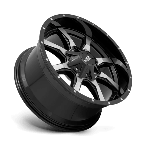 Moto Metal MO970 Gloss Black W/ Machined Face wheel showcasing a sleek design and off-road capability.