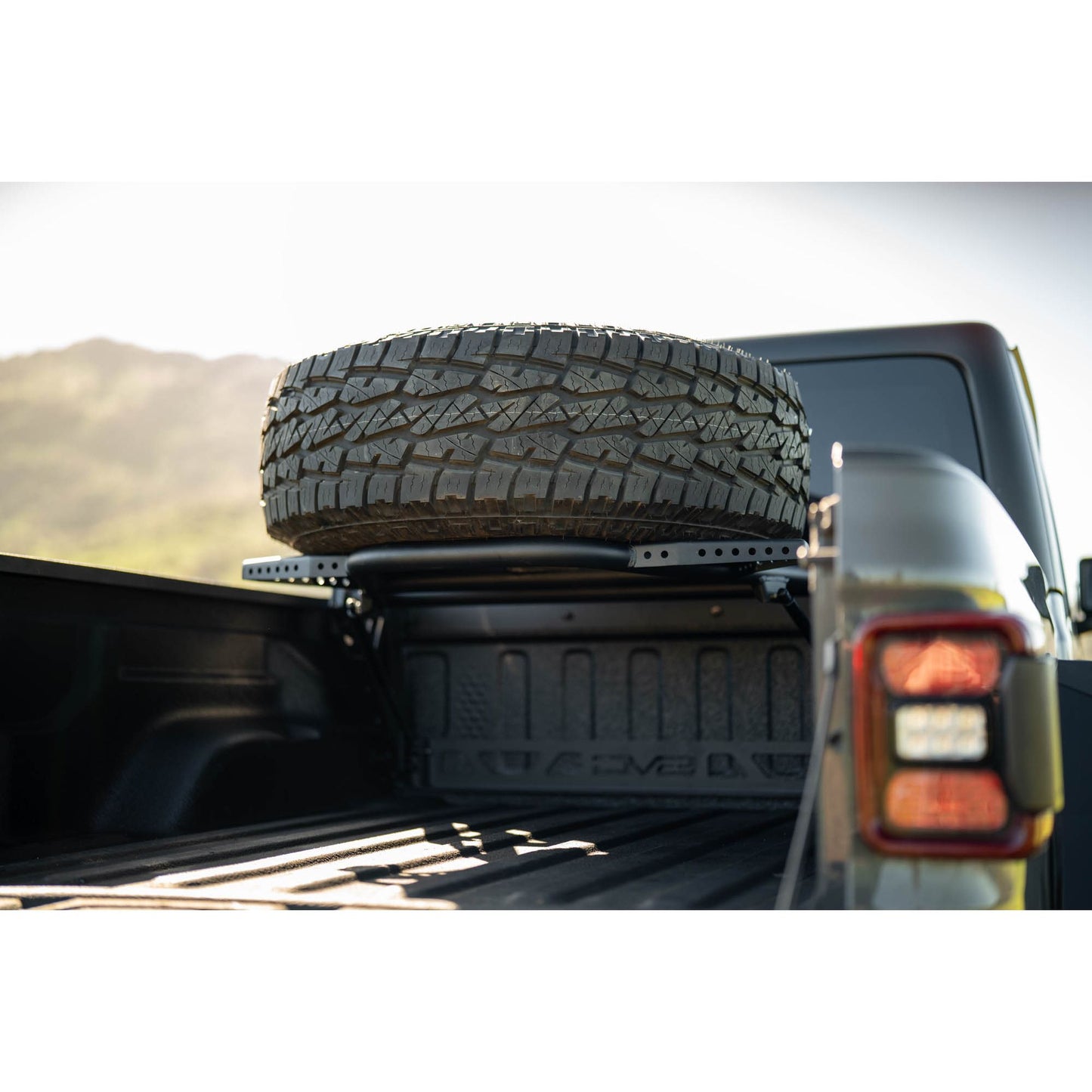 DV8 OFF-ROAD | 2020 2025 Jeep Gladiator JT Adjustable In Bed Tire Carrier  | TCGL-03
