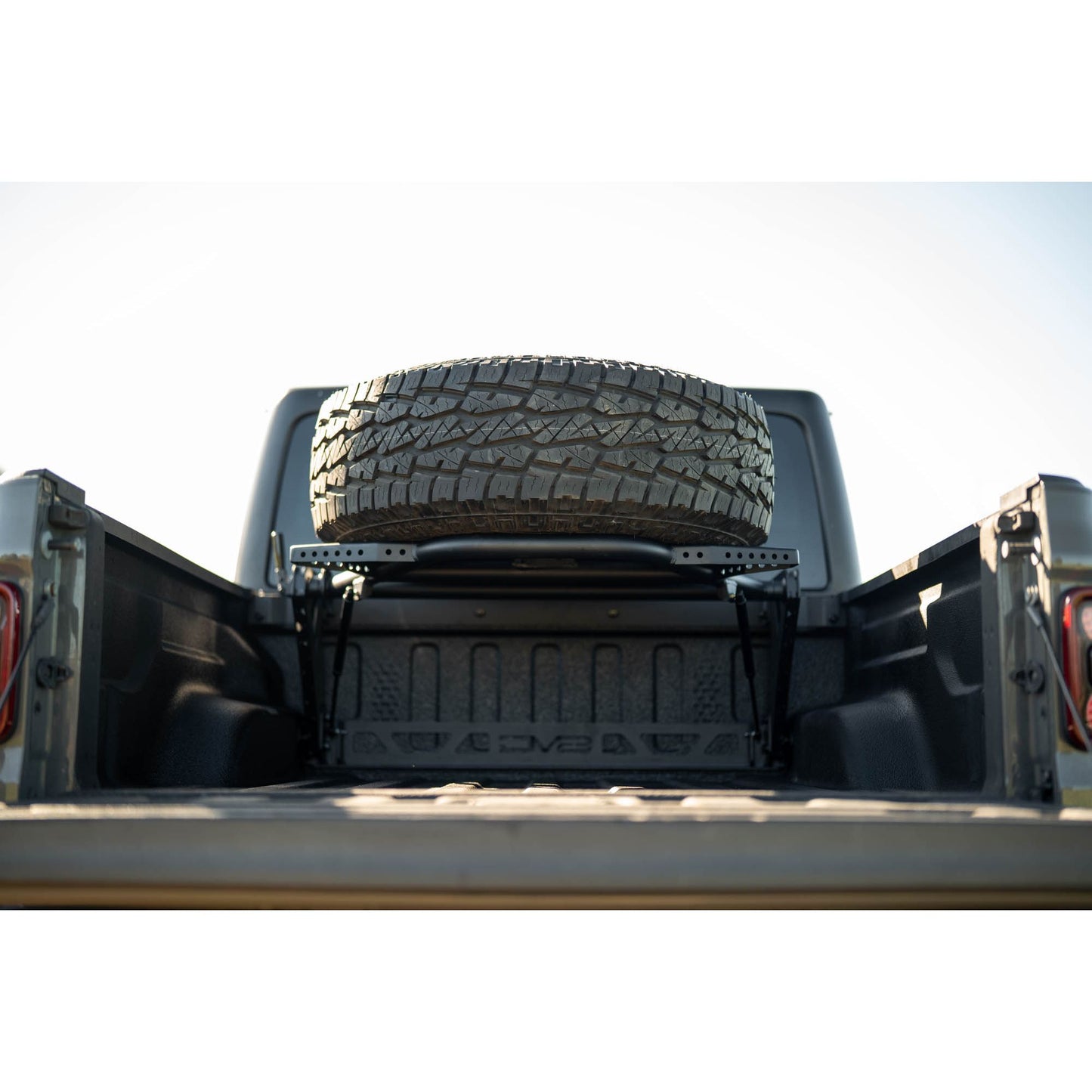 DV8 OFF-ROAD | 2020 2025 Jeep Gladiator JT Adjustable In Bed Tire Carrier  | TCGL-03