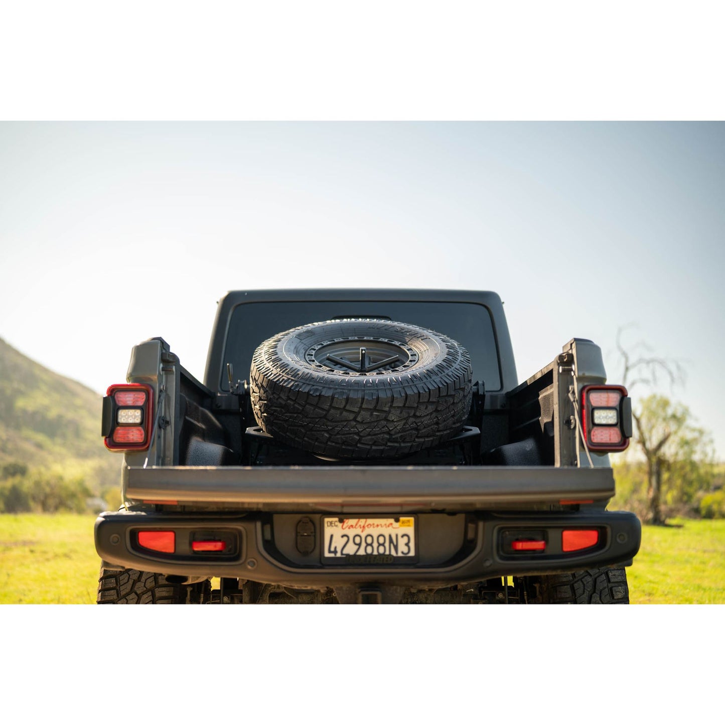 DV8 OFF-ROAD | 2020 2025 Jeep Gladiator JT Adjustable In Bed Tire Carrier  | TCGL-03
