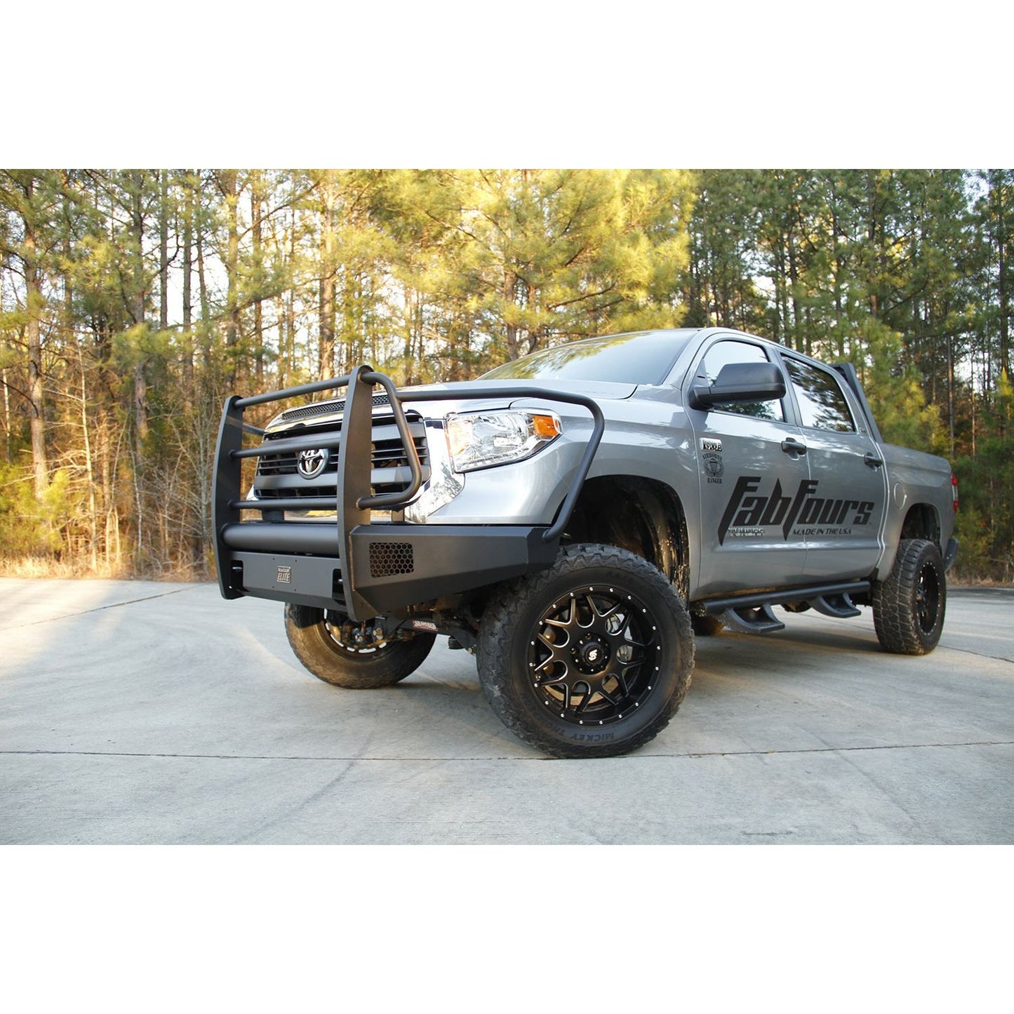 Fab Fours Elite Front Bumper 2 Stage Black Powder Coated w/Full Grill Guard Incl. Light Cut-Outs l TT07-R1860-1