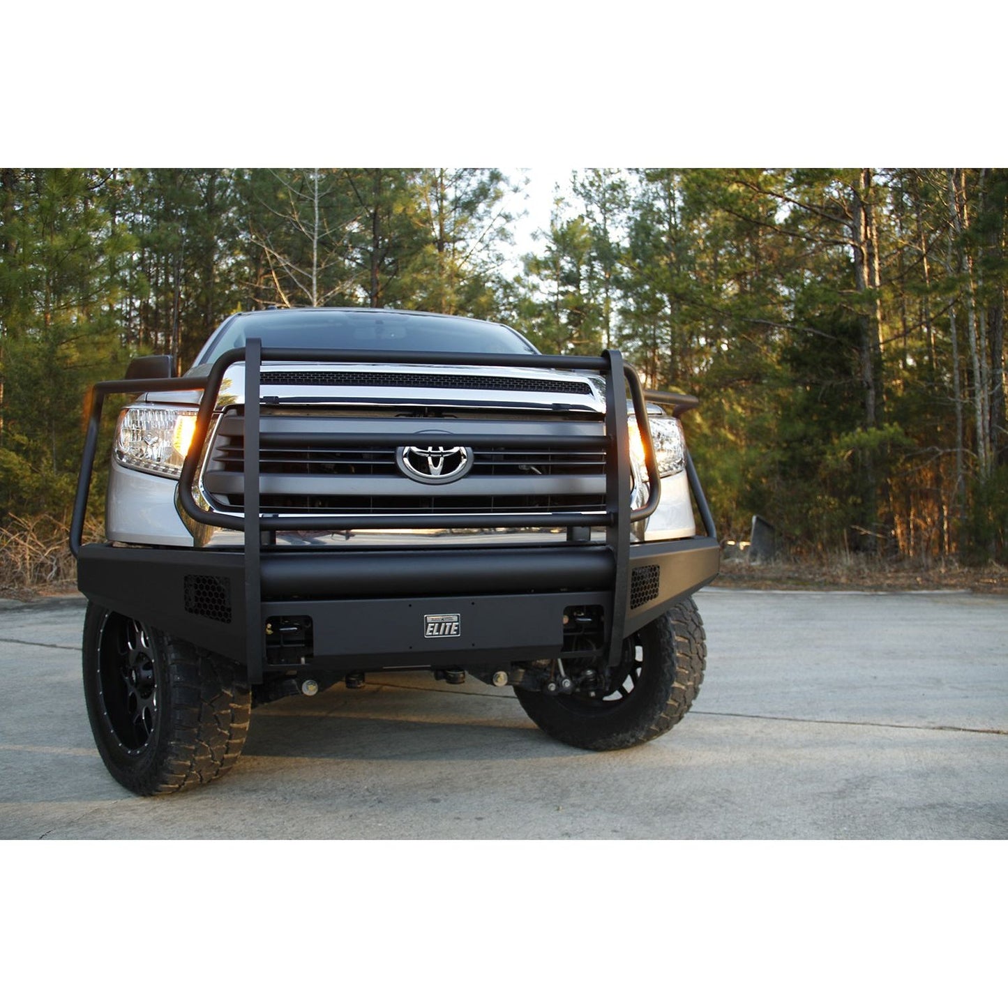 Fab Fours Elite Front Bumper 2 Stage Black Powder Coated w/Full Grill Guard And Tow Hooks l TT14-R2860-1