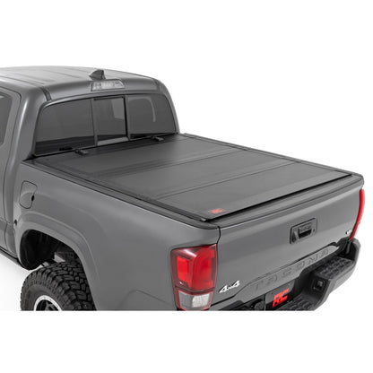 ROUGH COUNTRY Hard Tri-Fold Flip Up Bed Cover | 6' Bed | Toyota Tacoma 2WD/4WD (2016-2023) | 49420600