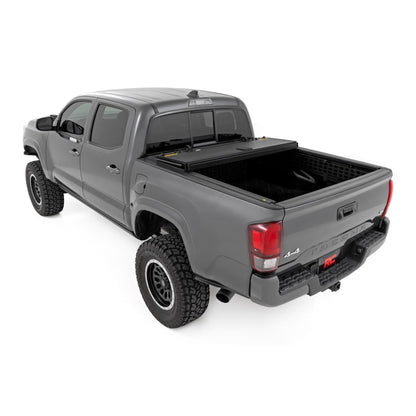 ROUGH COUNTRY Hard Tri-Fold Flip Up Bed Cover | 5' Bed | Toyota Tacoma 2WD/4WD (2005-2015) | 49415500
