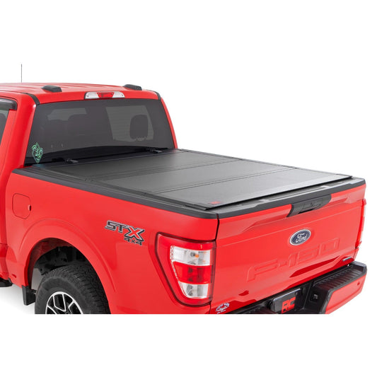 ROUGH COUNTRY | Hard Tri-Fold Flip Up Bed Cover  6'7" Bed  Ford F-150 2WD/4WD (2015-2020) | 49225650_A