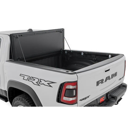 ROUGH COUNTRY Hard Tri-Fold Flip Up Bed Cover | 6'4" | Ram 1500 (19-25)/1500 TRX (21-24)  | 49320650
