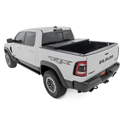 ROUGH COUNTRY Hard Tri-Fold Flip Up Bed Cover | 6'4" | Ram 1500 (19-25)/1500 TRX (21-24)  | 49320650