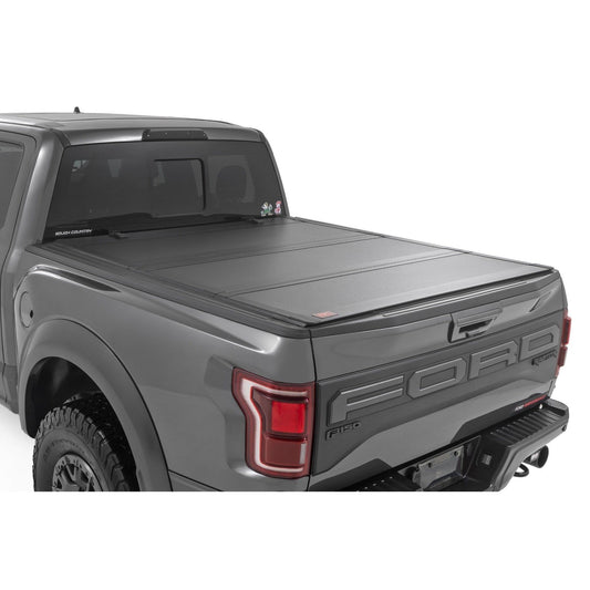 ROUGH COUNTRY Hard Tri-Fold Flip Up Bed Cover | 5'7" Bed | Ford F-150 (21-25)/F-150 Lightning (22-25)  | 49221550
