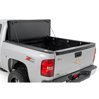 ROUGH COUNTRY Hard Tri-Fold Flip Up Bed Cover | 5'9" Bed | Chevy/GMC 1500 (07-13) | 49113551