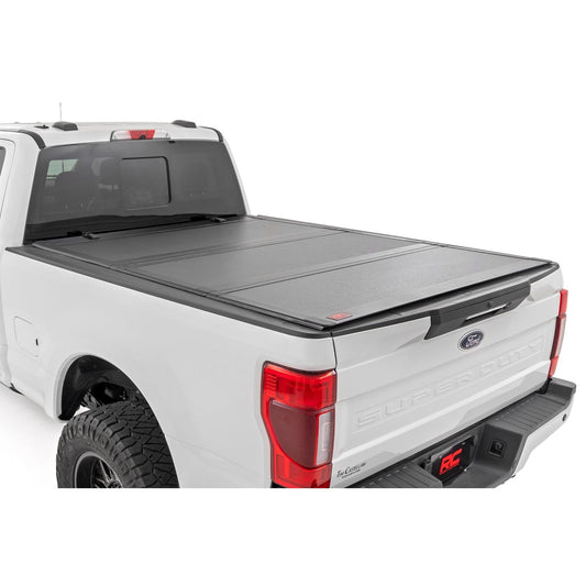 ROUGH COUNTRY Hard Tri-Fold Flip Up Bed Cover | 6'10" Bed | Ford F-250/F-350 Super Duty (17-26) | 49220651