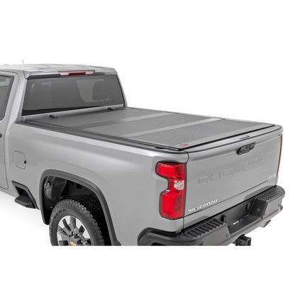 ROUGH COUNTRY Hard Tri-Fold Flip Up Bed Cover | 6'9" Bed | Chevy/GMC  Silverado/Sierra 2500HD/3500HD (20-25) | 49120651