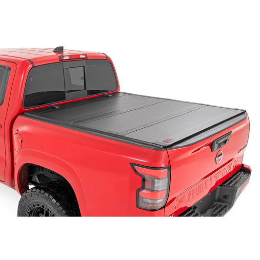 ROUGH COUNTRY Hard Tri-Fold Flip Up Bed Cover | 5' Bed | Nissan Frontier 2WD/4WD (22-25) | 49520551A