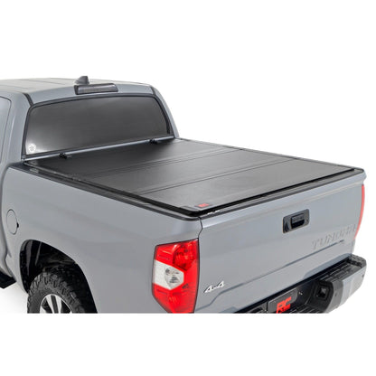 ROUGH COUNTRY Hard Tri-Fold Flip Up Bed Cover | 5'7" Bed | Toyota Tundra 2WD/4WD (07-21) | 49414551