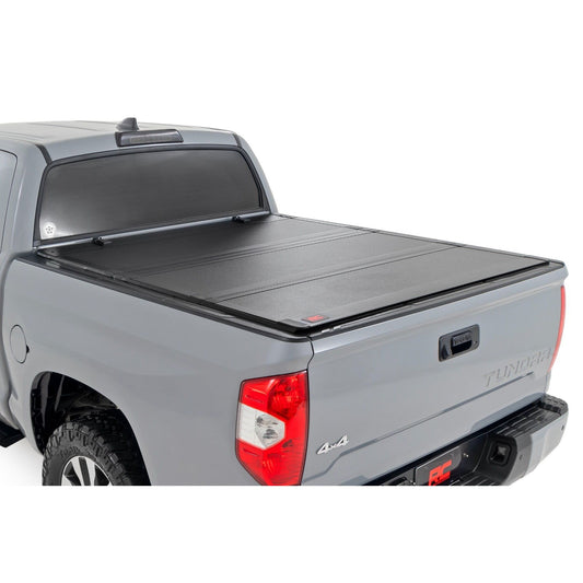 ROUGH COUNTRY Hard Tri-Fold Flip Up Bed Cover | 5'7" Bed | Toyota Tundra 2WD/4WD (07-21) | 49414551