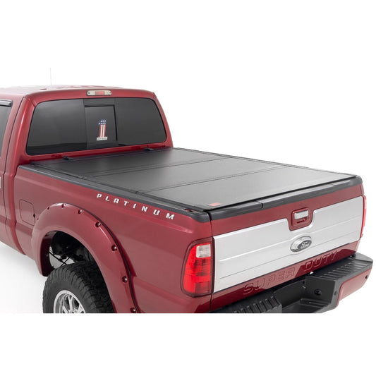 ROUGH COUNTRY Hard Tri-Fold Flip Up Bed Cover | 6'10" Bed | Ford F-250/F-350 Super Duty (99-16) | 49214651