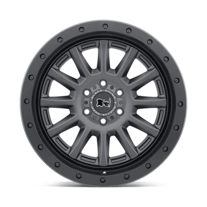 Black Rhino DUGGER Gun Black wheel featuring a 12-spoke design and rock guard ring for off-road protection.