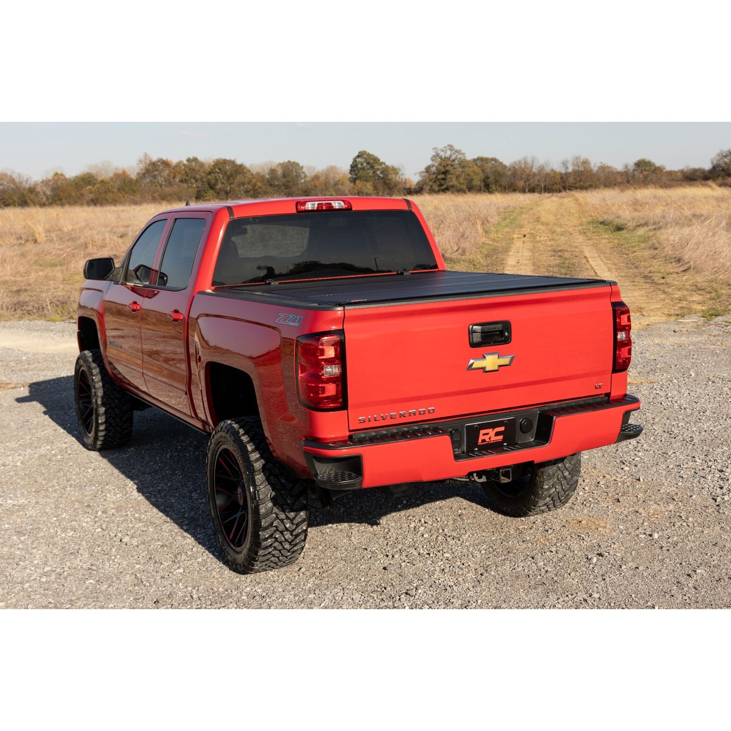 ROUGH COUNTRY Hard Tri-Fold Flip Up Bed Cover | 6'7" Bed | Rail Cap | Chevy/GMC 1500/2500HD/3500HD (14-19) | 49119651