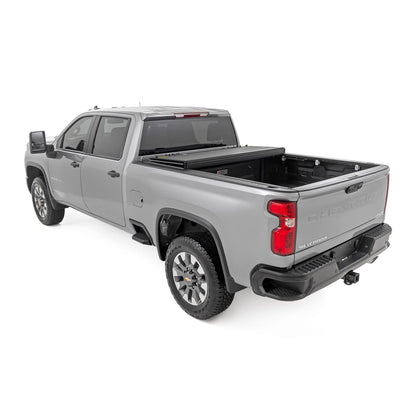 ROUGH COUNTRY Hard Tri-Fold Flip Up Bed Cover | 6'9" Bed | Chevy/GMC  Silverado/Sierra 2500HD/3500HD (20-25) | 49120651