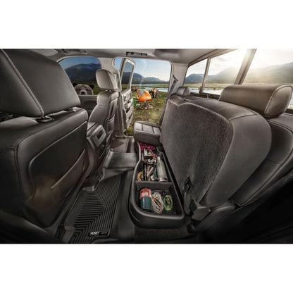 HUSKY | 19-C RAM 1500 CREW CAB BLACK UNDER SEAT STORAGE BOX W/O FACTORY STORAGE | 09421 is shown organizing tools under the back seat.