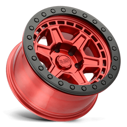 Black Rhino RENO Candy Red W/ Black Ring & Bolt showcasing its unique 6-spoke design and robust construction.