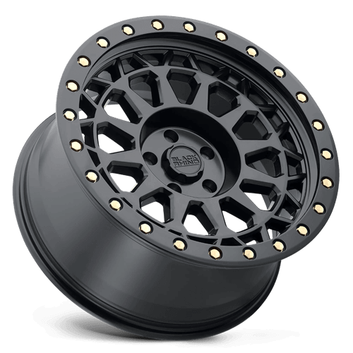 Black Rhino PRIMM Matte Black W/ Brass Bolts wheel showcasing aggressive styling and beadlock design.