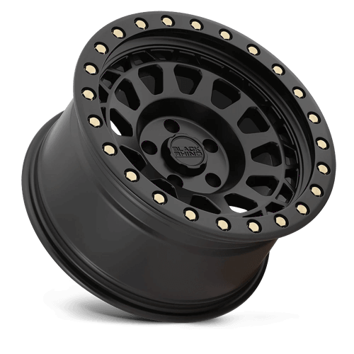 Black Rhino PRIMM Matte Black W/ Brass Bolts wheel showcasing aggressive styling and beadlock design.