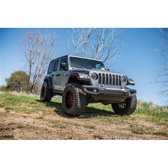ZONE OFFROAD | 3" Suspension System for 18-C Jeep Wrangler JL 4 Door Models J31N on a rugged terrain.
