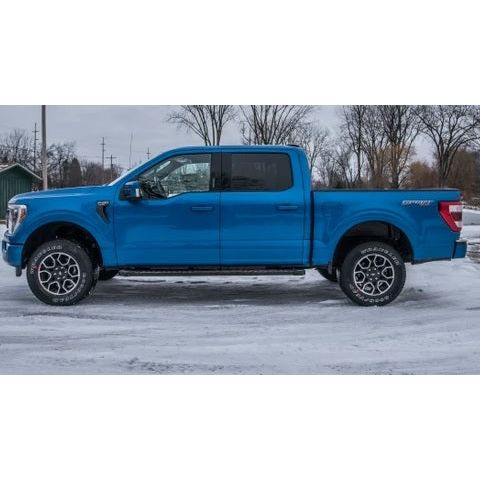 ZONE OFFROAD |  2 Inch Lift Kit   I ZONF1215 installed on a blue F150 truck in snow